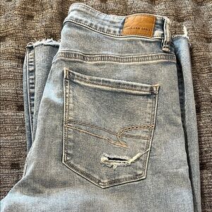 American Eagle Outfitters Light Blue Next Level Stretch Ripped Wide Leg Jeans